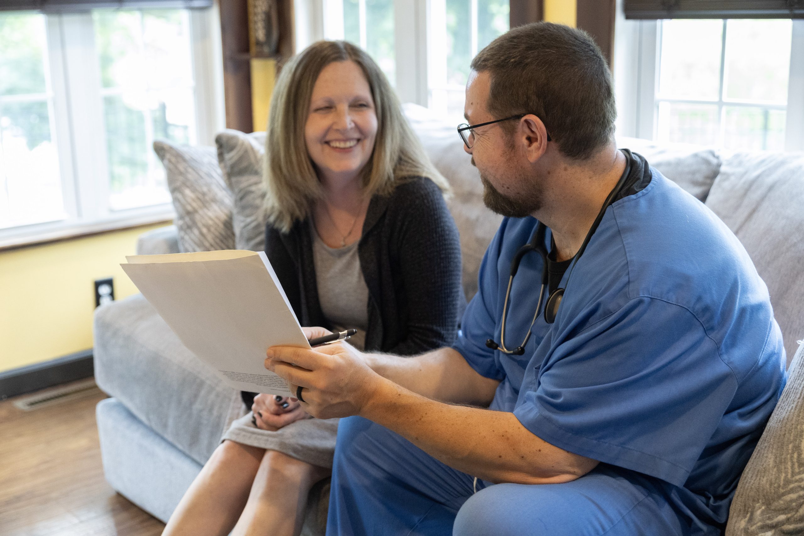 A Concordia Visiting Nurses RN goes over a care plan with a patient