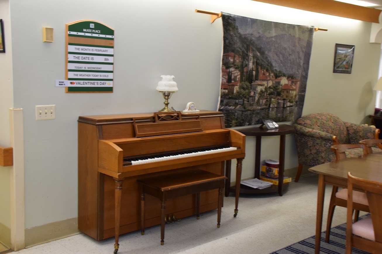 Concordia at RP Home personal care common area with a piano